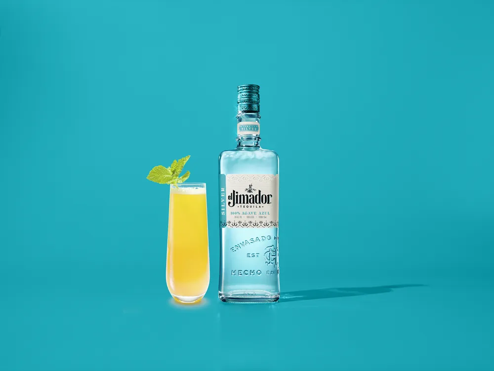 El Jimador tequila campaign image with agave and bottles in a moody bar setting