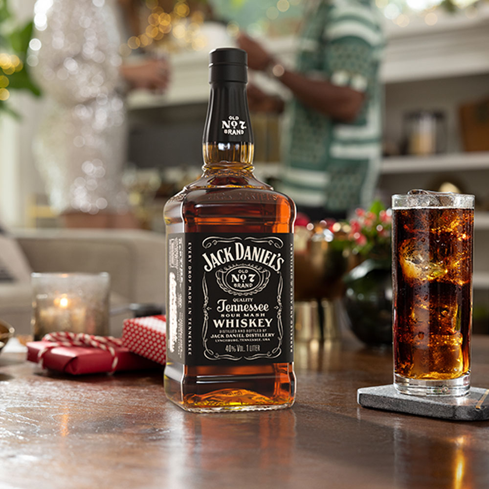 Jack Daniel's Tennessee whiskey bottle and cola serve